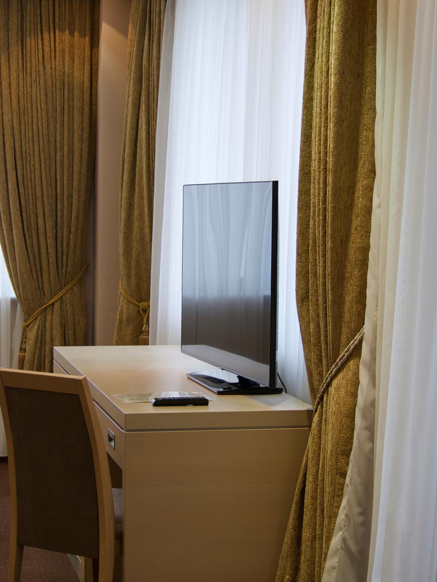 Caspian Riviera Grand Palace Hotel Aqtau Exterior foto A television set